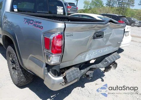 2022 Toyota Tacoma Double Cab z USA, uszkodzony, nr VIN 3TMAZ5CN6NM176313